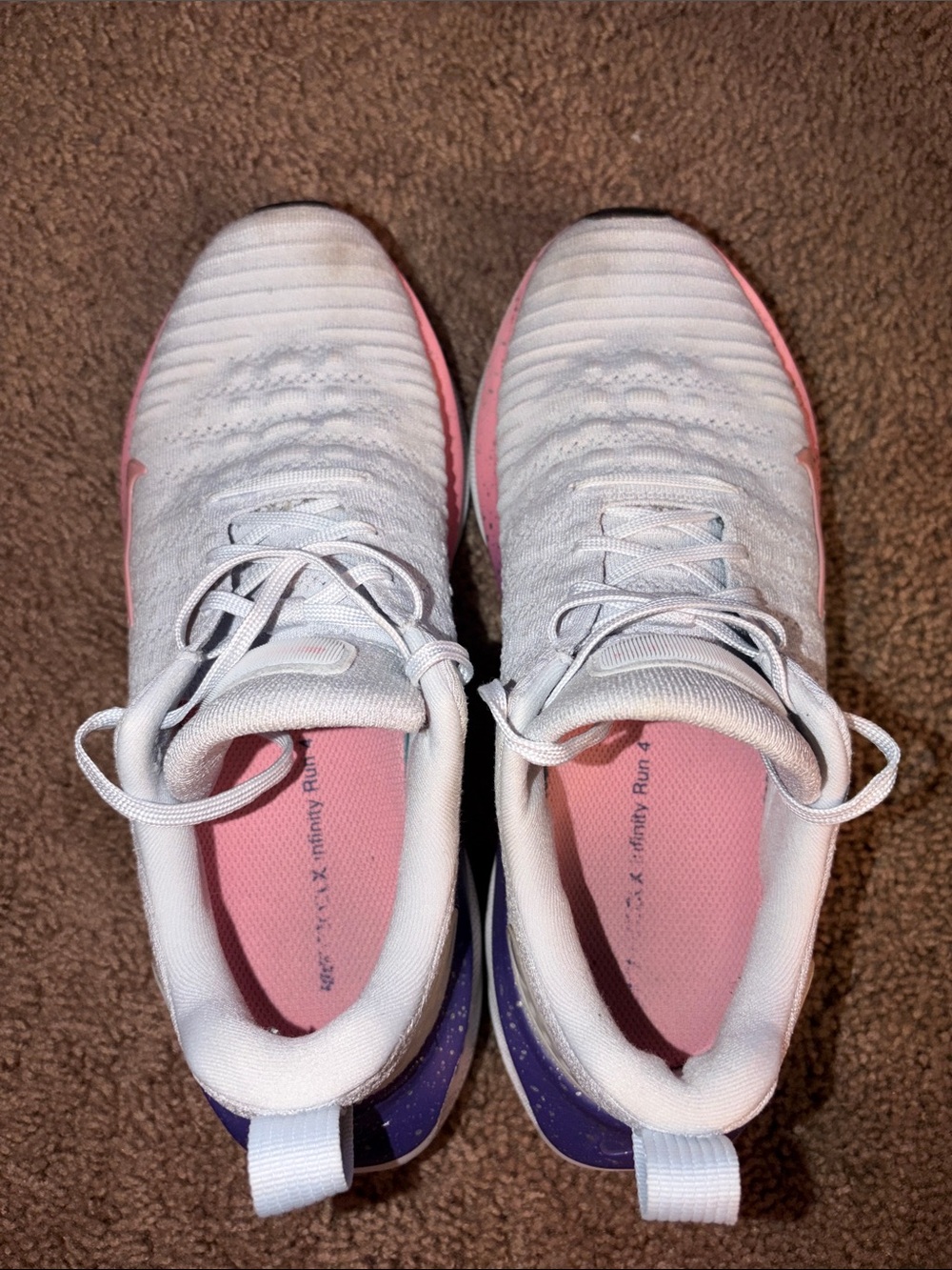 Nike Women’s React Infinity Run 4
Light Blue with Pink & Purple Accents - Picture 9 of 11
